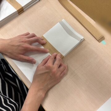 帯掛け作業