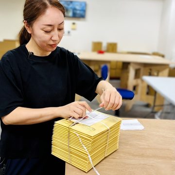 紐かけ